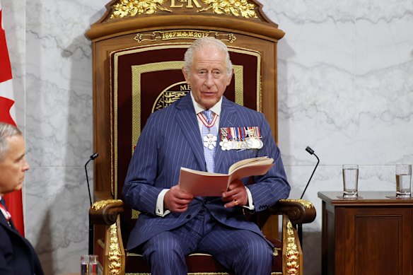 King Charles opening the Canadian parliament from the throne in the Senate. 