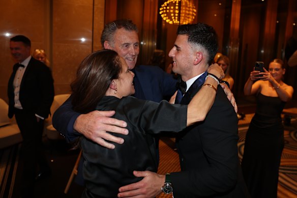Nick Daicos (right) with his parents Peter and Colleen.