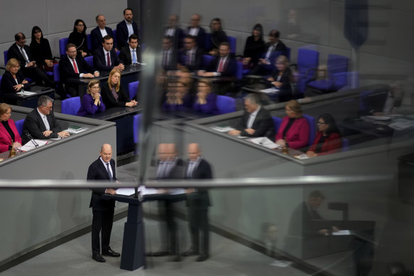 German Chancellor Olaf Scholz speaks during a plenary session at the German parliament Bundestag before the vote.