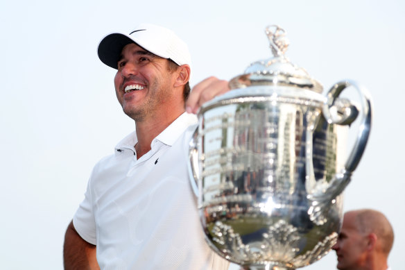 Brooks Koepka with the Wanamaker Trophy.