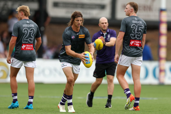 Nat Fyfe warms up for Fremantle before playing the first half of the match simulation game against West Coast.