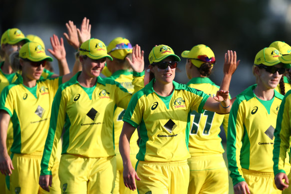 Australia celebrates after winning game one of the Women's ODI against Sri Lanka. 