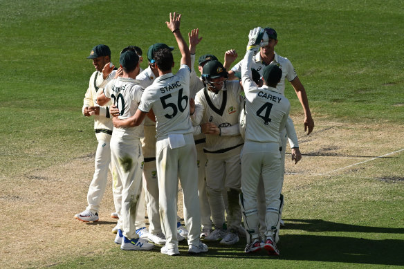 The Australians celebrate victory during day four of the Second Test.