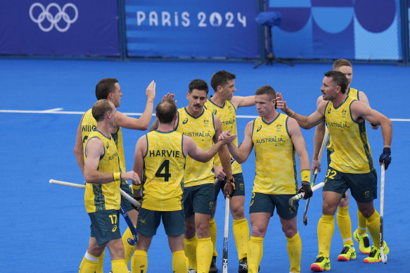 Australia’s Blake Glovers, fourth left, celebrates after scoring his side’s first goal against Argentina at Paris 2024.