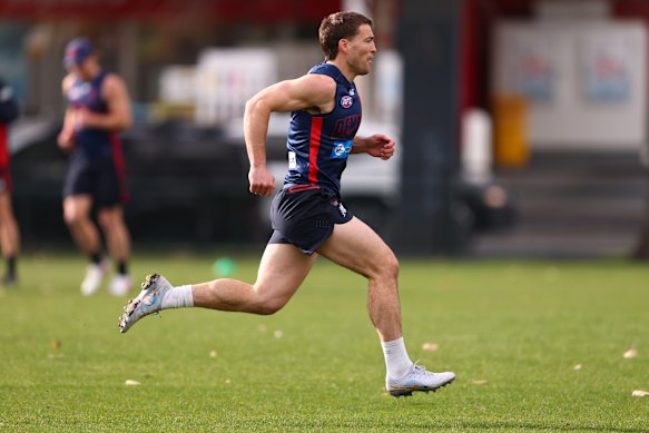 Viney stretches out at training.