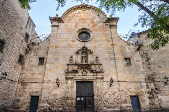 An 18th century church of the Oratory of Saint Philip Neri with facade bearing holes from the Spanish Civil War.