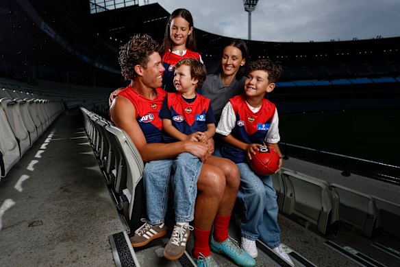 Jake Melksham has taken the long road to 250 games. He’s pictured here with wife Stacey, daughter Frankie, and sons Alfie and Teddy at the MCG.