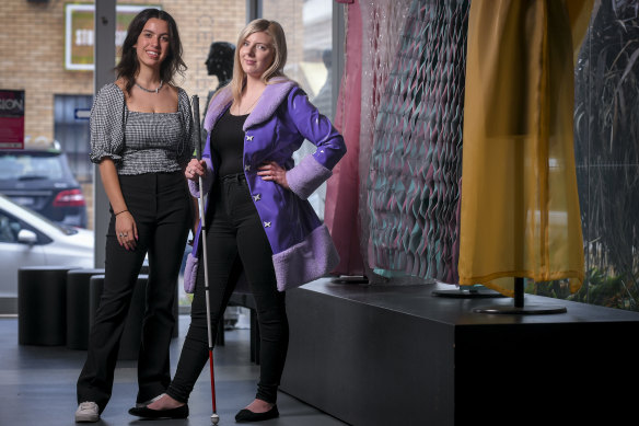 Kathryn McPherson (right) wearing the coat designed for her by Kangan Institute graduate Sabrina Sekerovski.