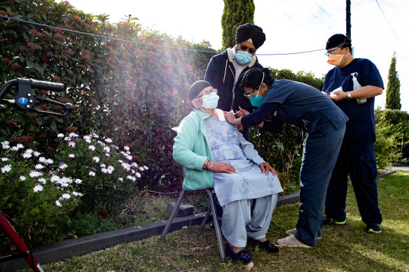 Mohinder Kaur  gets her vaccination at the Sikh temple, Gurdwara Sahib, in Glenwood.