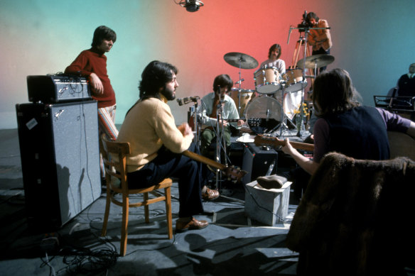 Paul McCartney, George Harrison, Ringo Starr and John Lennon in <i>The Beatles: Let It Be</i>.
