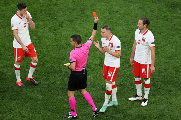 Poland’s Grzegorz Krychowiak gets his marching orders in St Petersburg.