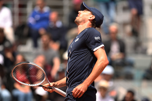 John Millman of Australia in trouble against Sebastian Korda of the US at Roland Garros on Tuesday. 