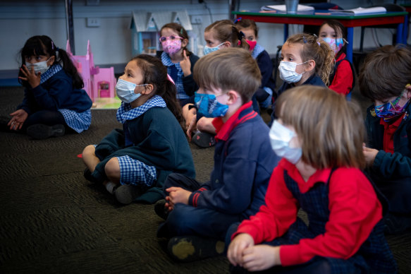 Prep students going back to school on the first day at St Margaret Mary’s school in Brunswick.