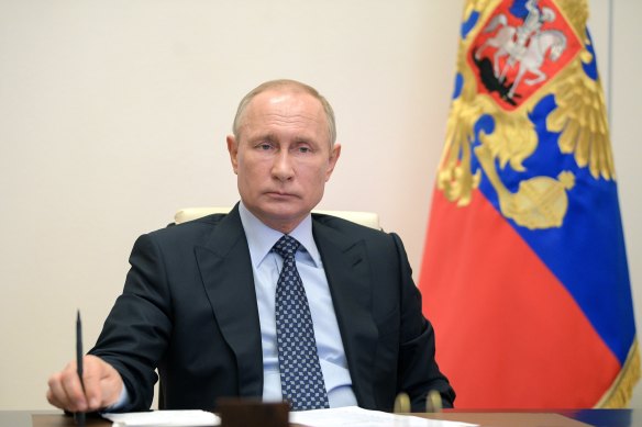 Russian President Vladimir Putin, pictured in a video conference last week, has suffered a fall in popularity according to recent polling. 