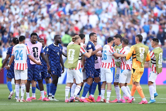 Players have words at full-time.