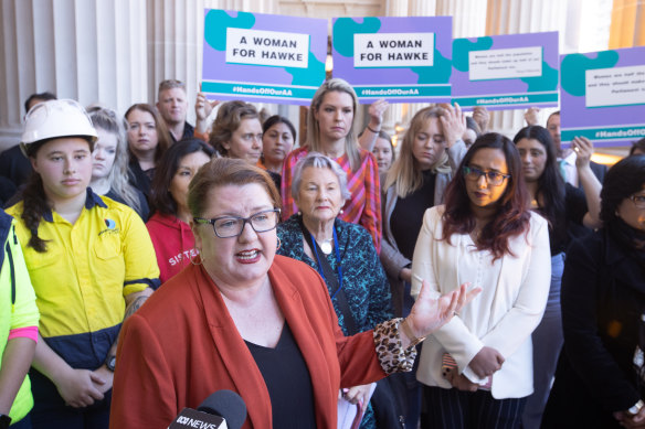 Corrections Minister Natalie Hutchins on the steps of the Victorian Parliament last year, pushing for the federal seat of Hawke to go to a woman.