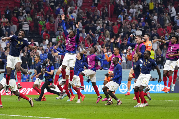 French players celebrate their semi-final win.