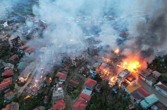 In this photo released by the Chin Human Rights Organisation, fires burn in the town of Thantlang in Myanmar’s north-western Chin state on October 29 this year.