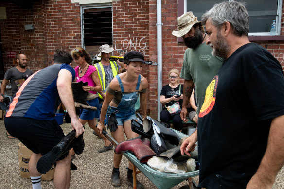 Mullumbimby local volunteers with donated goods for flood victims.