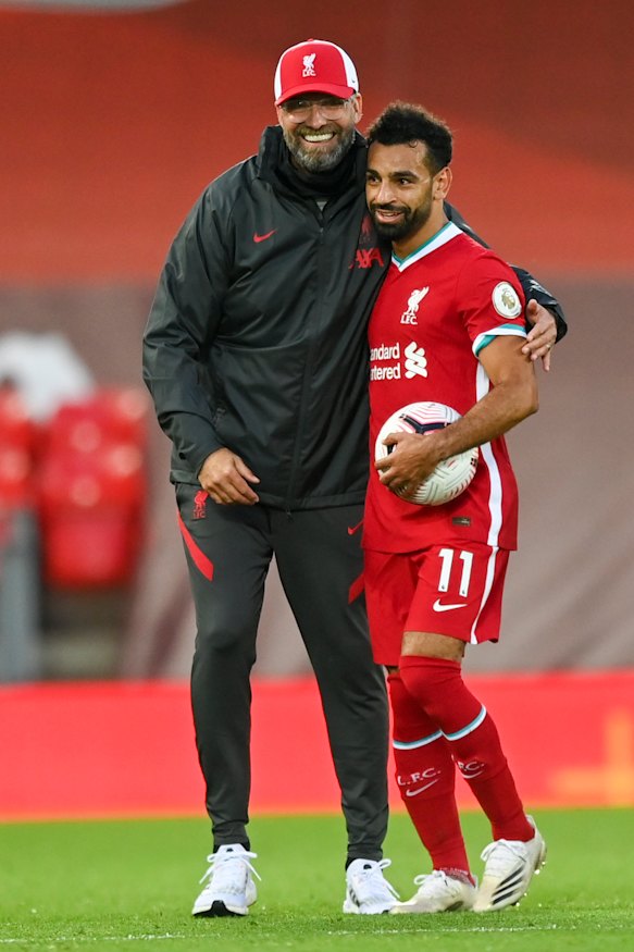 Liverpool manager Jurgen Klopp with  striker  Mohamed Salah.