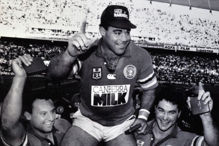 Canberra hero: Mal Meninga is chaired off the field after leading the Raiders to grand final victory over Canterbury in 1994.