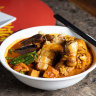 Malaysian curry mee with crispy pork.
