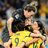 Mackenzie Arnold celebrates with her fellow Matildas after Cortnee Vine’s winning kick.