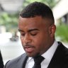 Ezra Mam reads a statement outside Brisbane Magistrates Court on Monday, apologising to his family, his fans, his club and the NRL.