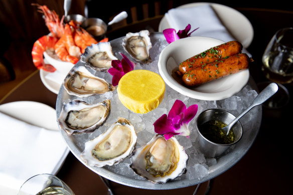 Sydney rock oysters with nuoc cham and ginger chipolatas.