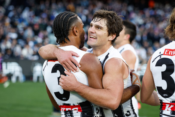Magpies Isaac Quaynor and Lachie Schultz after their side’s thrilling win.
