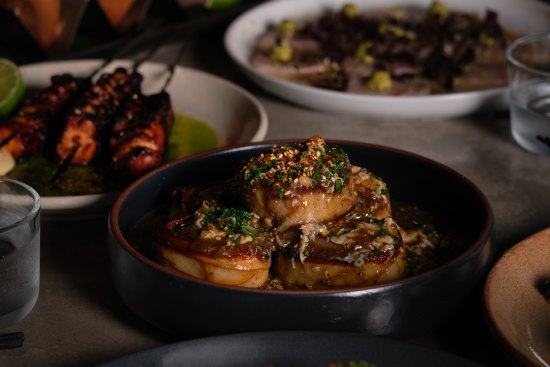 Miso potato with spiced gravy, prawns and chives at Gwylo.