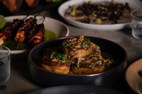 Miso potato with spiced gravy, prawns and chives at Gwylo.