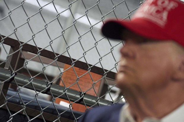 President Donald Trump tours Alligator Alcatraz, a new migrant detention facility in Florida.
