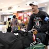 Mitchell Starc arrives home in Sydney on Sunday after the IPL was postponed.