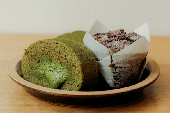 Matcha swiss roll (left) and a muffin at Cafe Cre Asion in North Sydney.