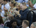 Bevan Slattery, phone in hand, at the Australian Open men’s final on Sunday.