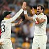 Mitchell Starc celebrates a wicket at the Gabba.