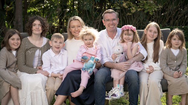 Dominic and Helen Perrottet pictured in 2024 when they were a family of nine.