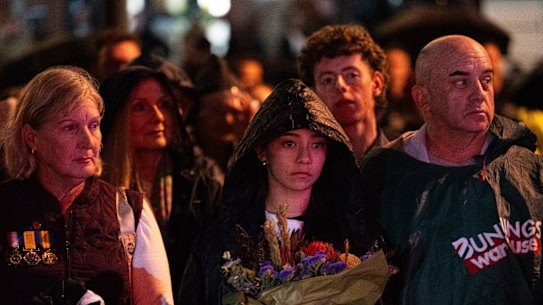 Thousands of people braved threatening weather conditions to attend the Anzac Day dawn ceremony in the heart of the Brisbane CBD.