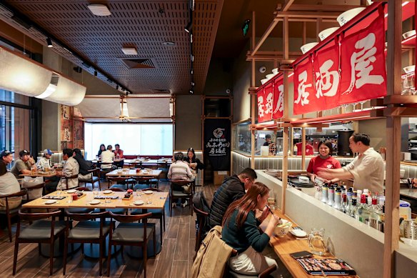 The space seats 150, with a bar for solo diners and booths for groups.