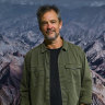 Murray Fredericks stands in front of one of his earliest landscapes, shot in Ladakh.