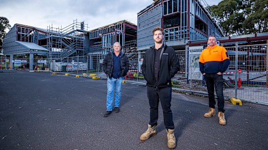 Aaron Lanfranchi with fellow tradesman Chris Richardson and Anthony Richardson at the Coburg High School worksite. 