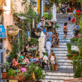 Local icon… diners line the Plaka Stairs.