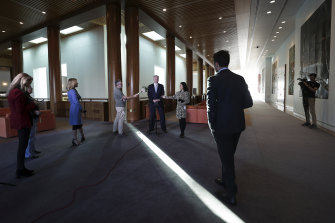 Social distancing during a press conference for Finance Minister Mathias Cormann.