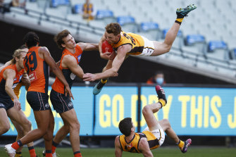 Tim O’Brien lands after a spectacular mark.