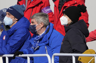China’s Peng Shuai, right, watches Eileen Gu at the women’s freestyle skiing big air finals with Thomas Bach, centre, President of the International Olympic Committee at the 2022 Winter Olympics.