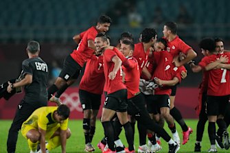 Egyptâ€™s players celebrate their 2-0 victory over Australia - but one of them has now been suspended.