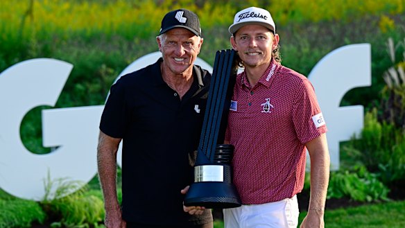 Cameron Smith with LIV Golf chief executive Greg Norman after his win in Chicago.