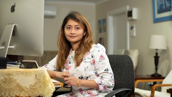 Pan Sandar Myint works from her home in Yagoona in her garage.