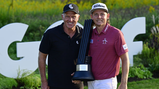 Cameron Smith with LIV Golf chief executive Greg Norman after his win in Chicago.